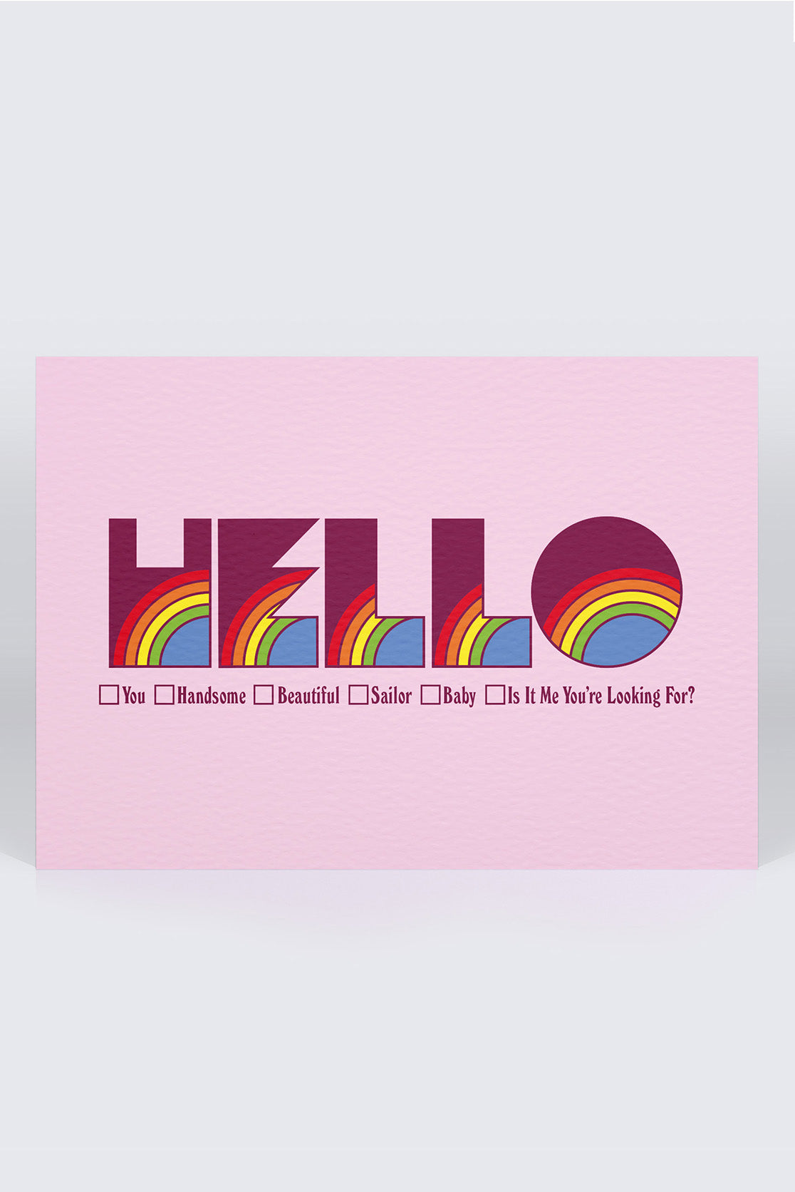 Greeting card with colourful &#39;hello&#39; working on a pale pink background