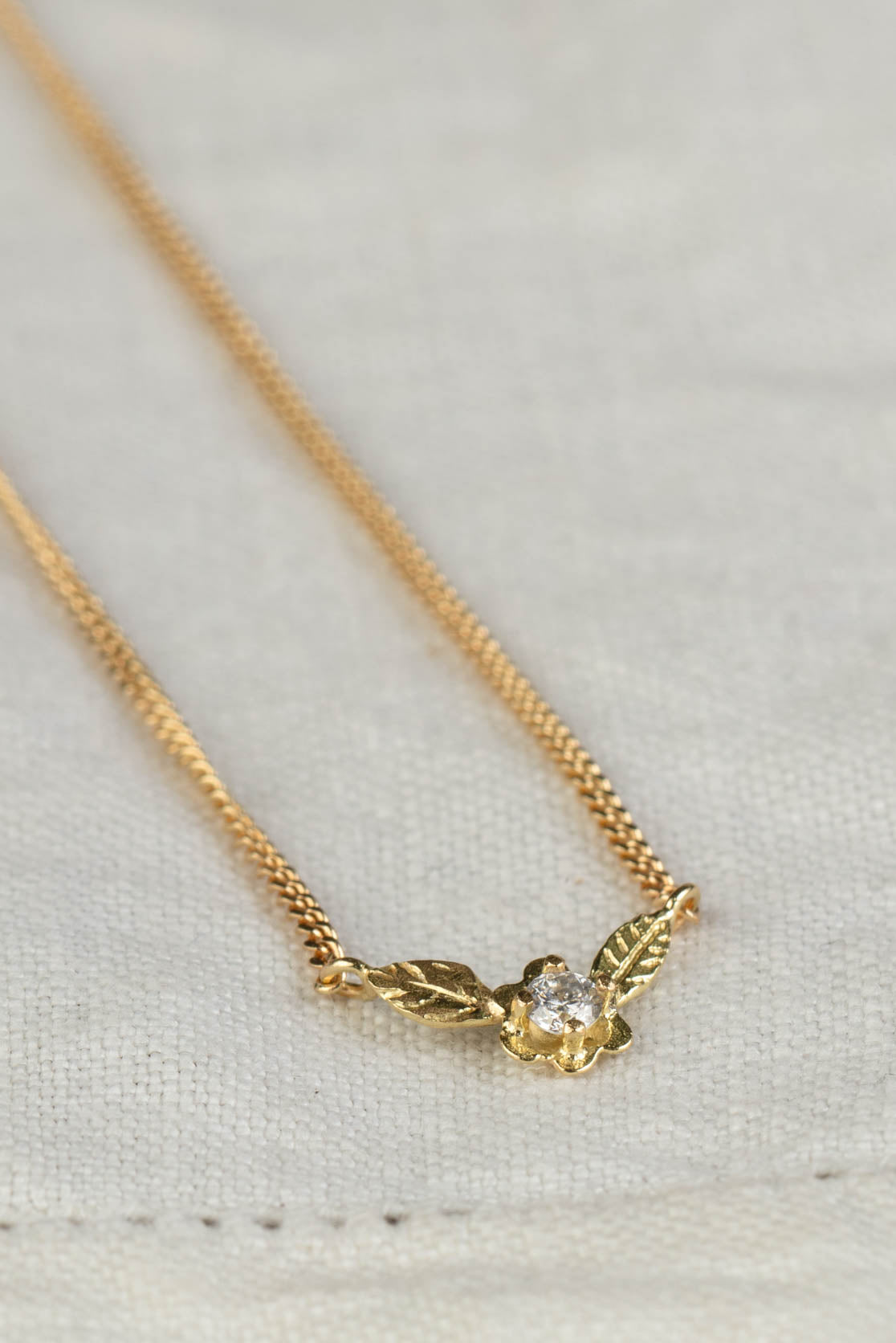 handmade diamond flower necklace in 18ct gold