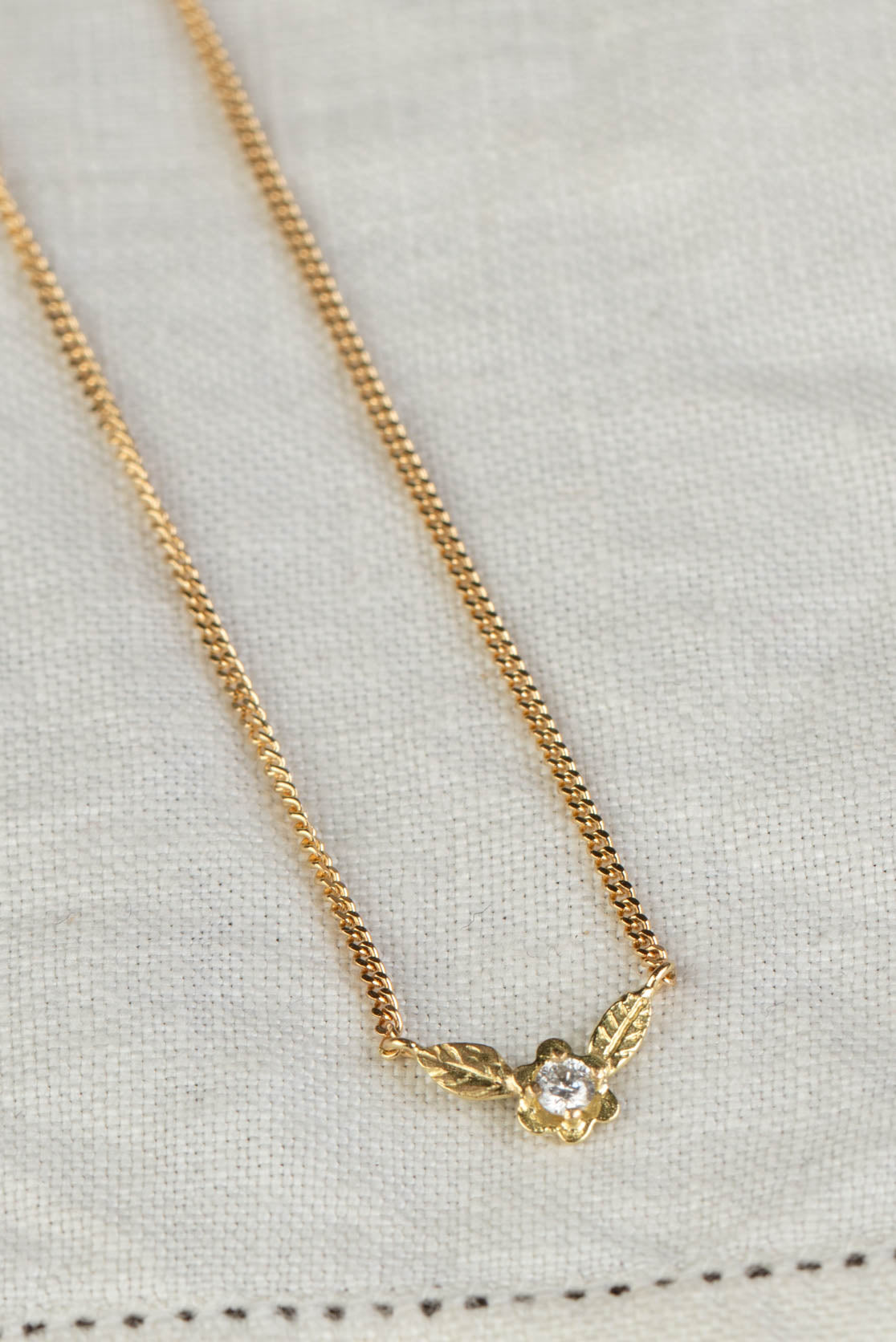 diamond and gold flower necklace
