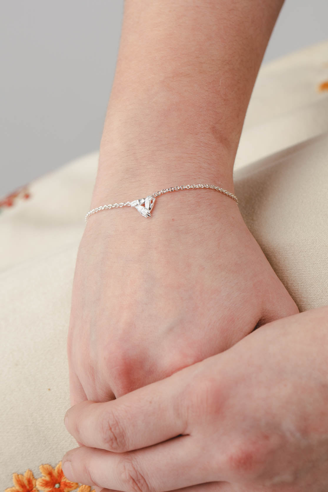 Three Supporting Hands Bracelet