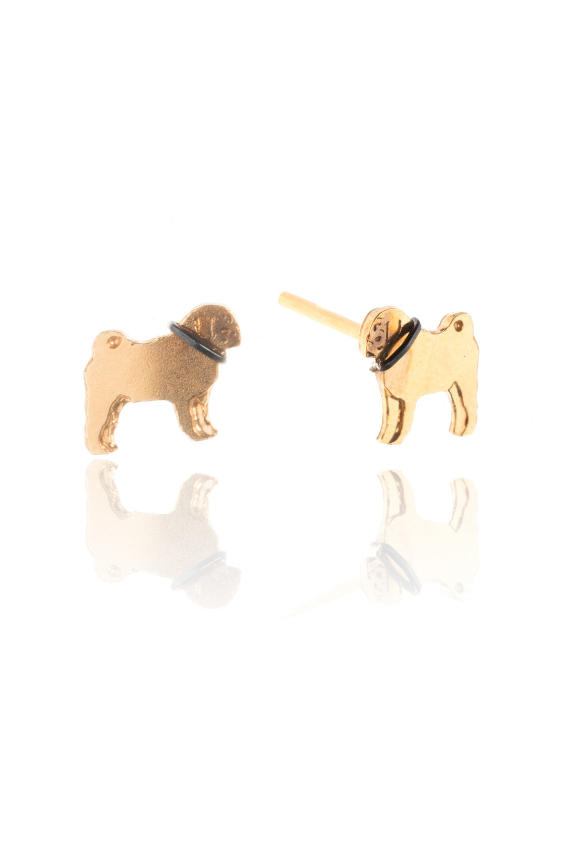 Tiny pug earrings in gold, with a contrasting black collar. 