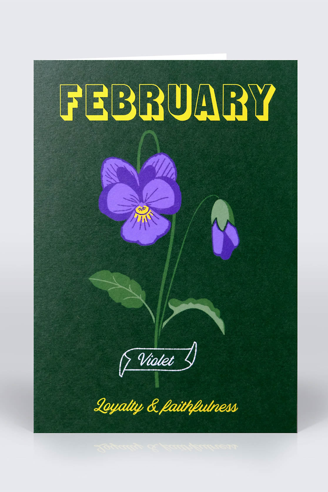February birthday card with violets on front cover and dark green background