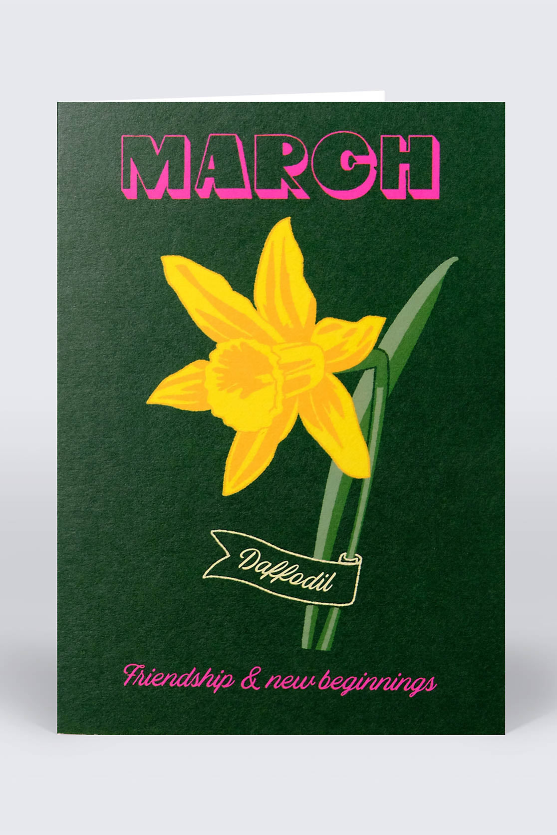 Dark green March birthday card with bright yellow daffodil flower on the front cover