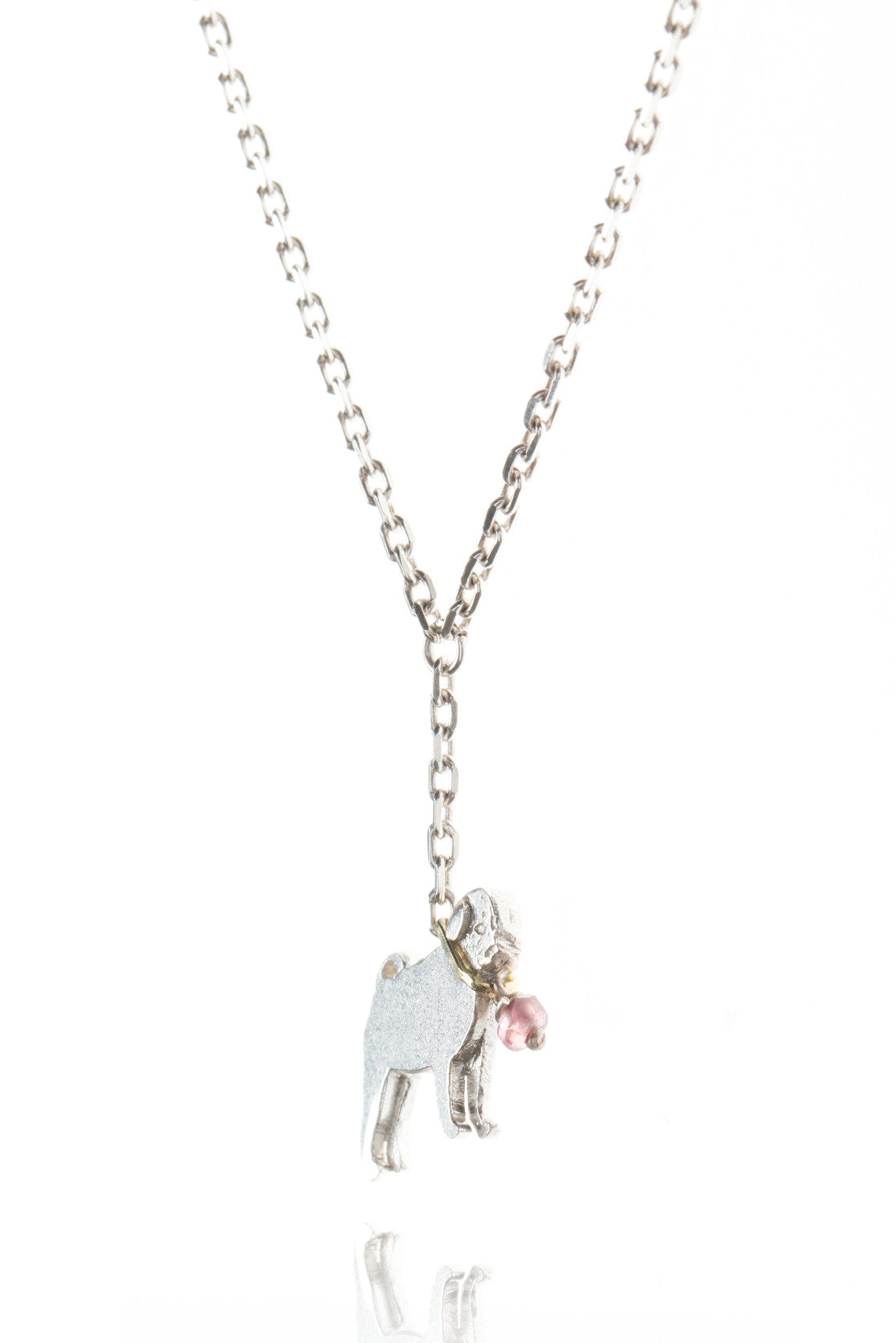 Pug on a lead bracelet, featuring a sterling silver pug with contrasting gold collar and pink moonstone charm