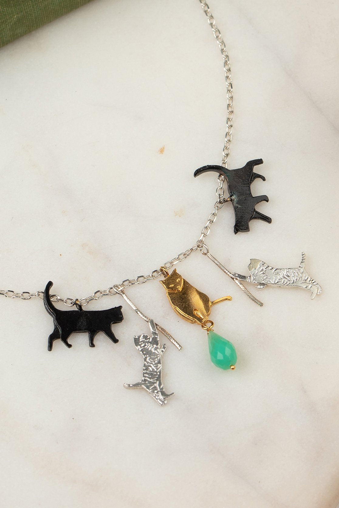 Large cat necklace in sterling silver and gold with green stone