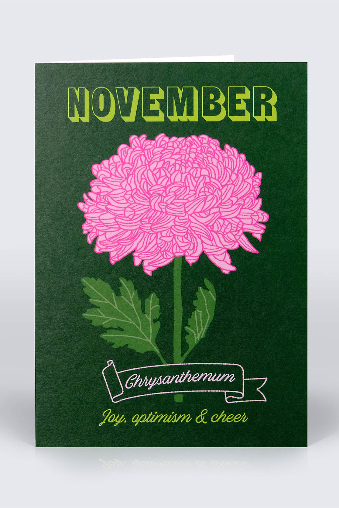 Dark green November birthday card with pink chrysanthemum on the front cover
