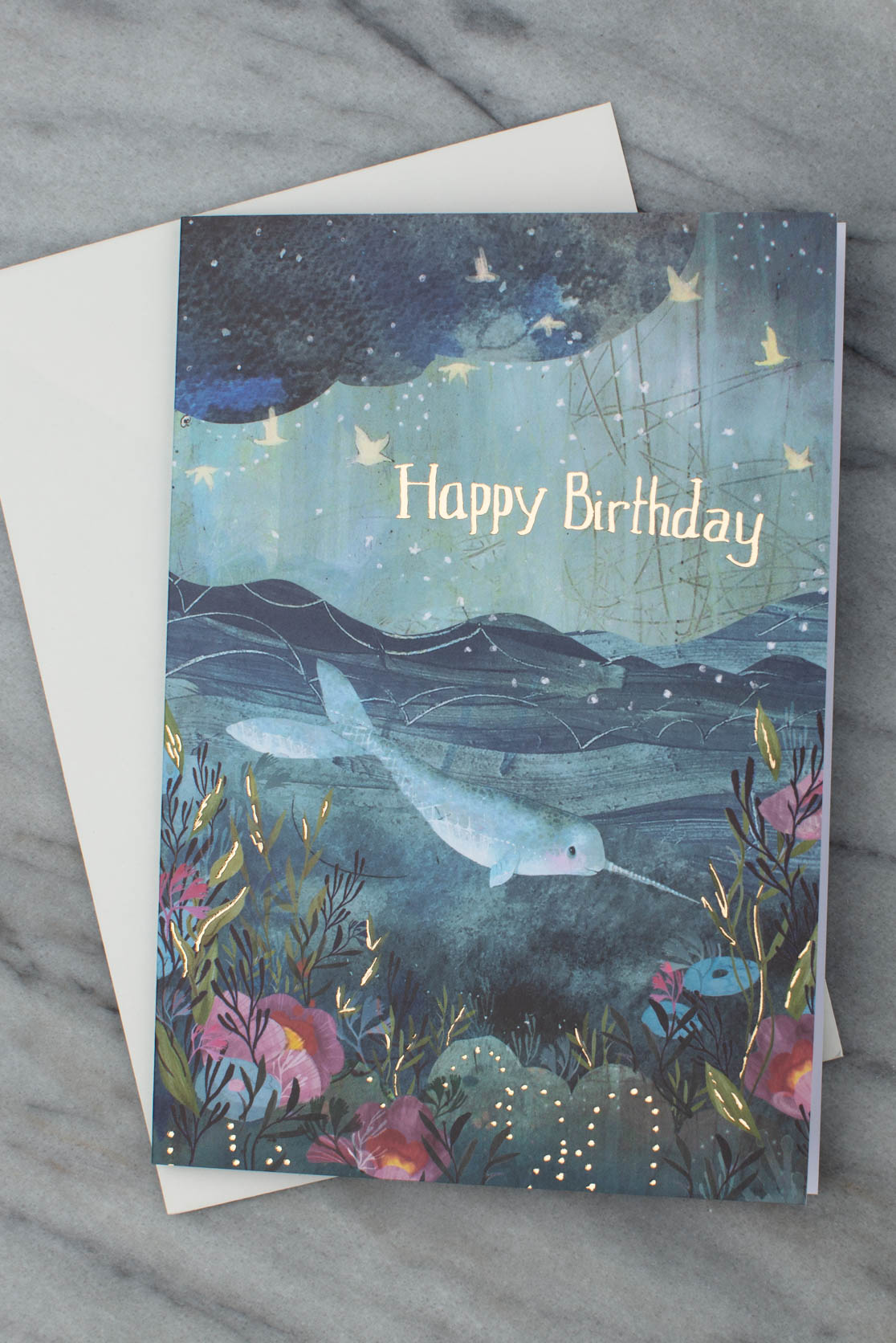 Blue birthday card with a white envelope