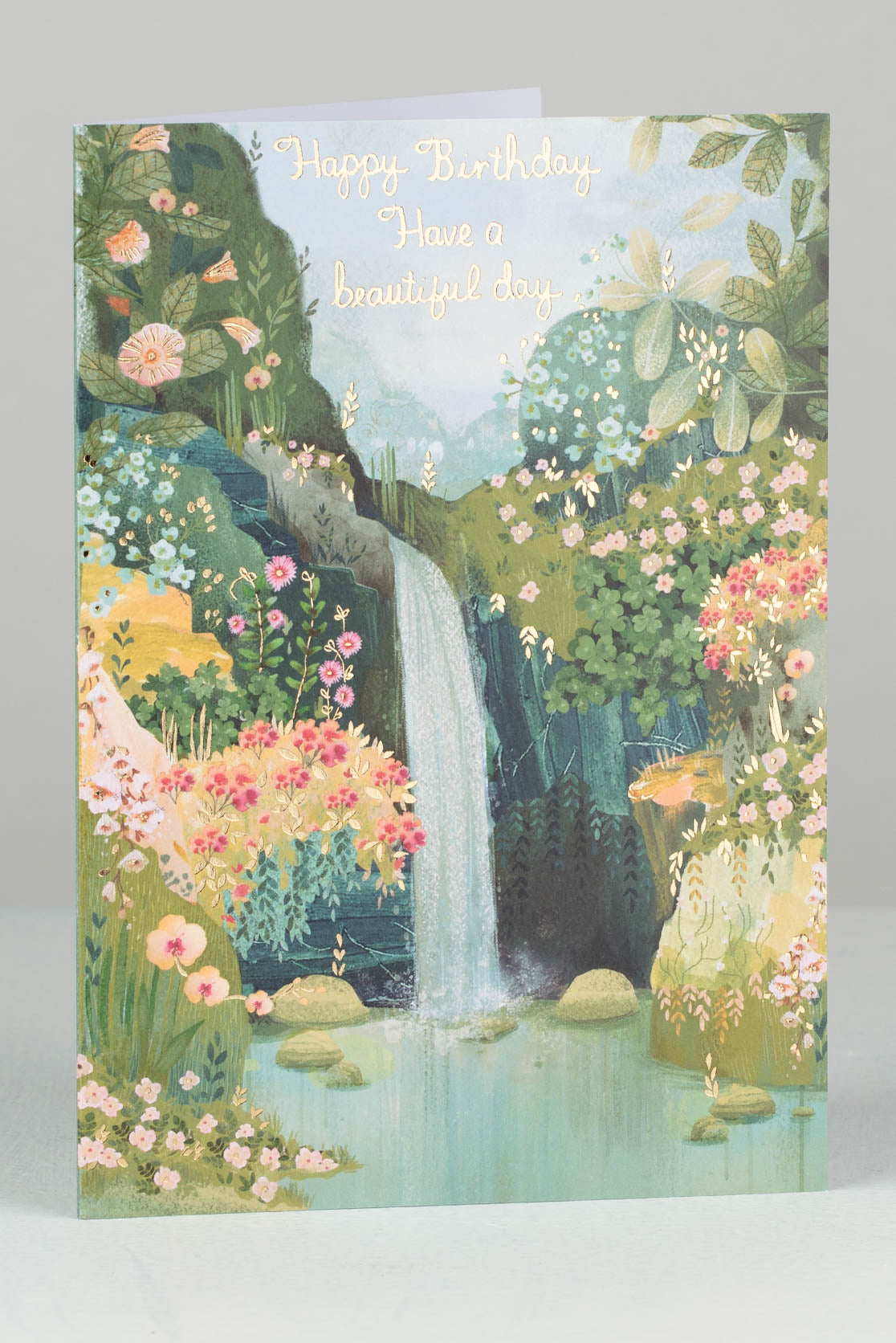 Happy Birthday card with image of a waterfall and flowers